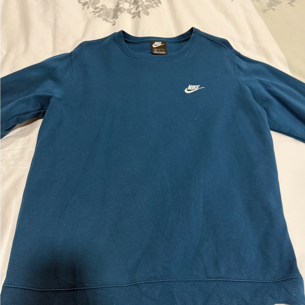 Light blue Nike crew neck sweatshirt